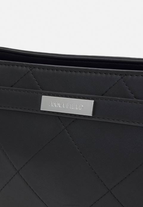 mujer bandolera negra Anna Field 84Z82508
