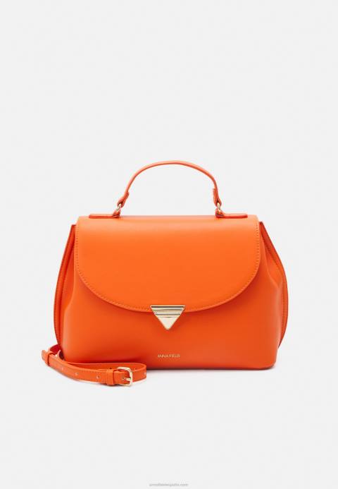 mujer bolso naranja Anna Field 84Z82301