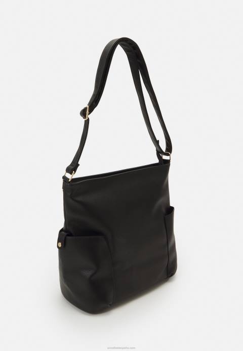 mujer bolso negro Anna Field 84Z82333