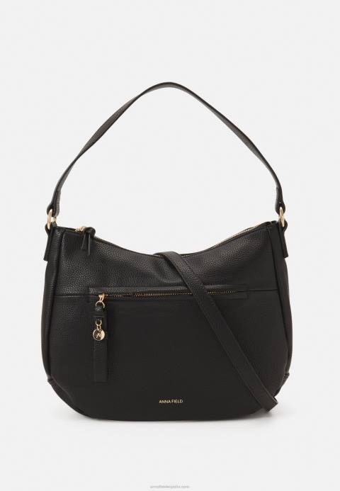 mujer bolso negro Anna Field 84Z82337