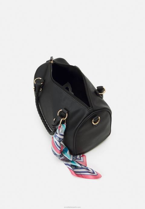mujer bolso negro Anna Field 84Z82343