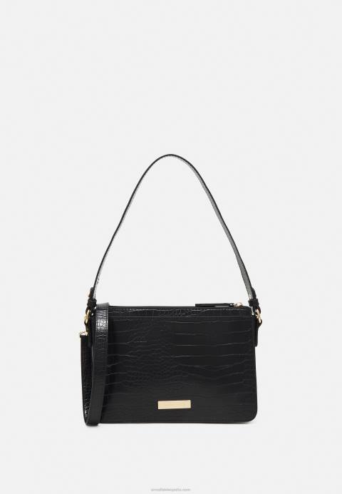 mujer bolso negro Anna Field 84Z82365