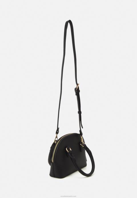 mujer bolso negro Anna Field 84Z82384